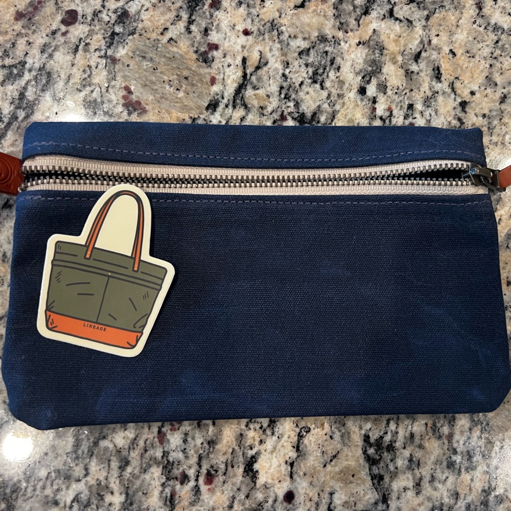 Lineage zipper navy pouch new with sticker
